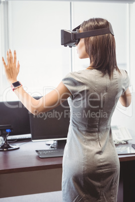 Business woman using 3D glasses