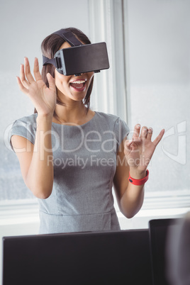 Business woman using 3D glasses