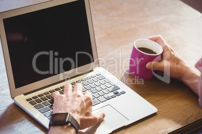 Businessman using his computer