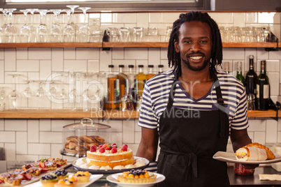 Handsome waiter standing