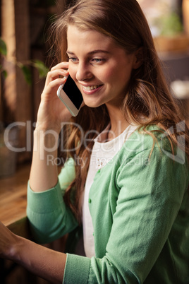 Portrait of casual woman on the phone