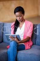 Portrait of businesswoman working with a tablet computer