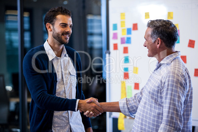 Coworkers shaking hands