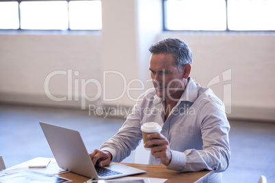 Businessman working on his laptop