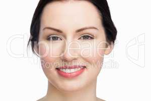 Smiling beautiful woman posing with natural makeup