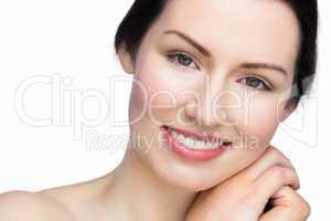 Smiling beautiful woman posing with natural makeup