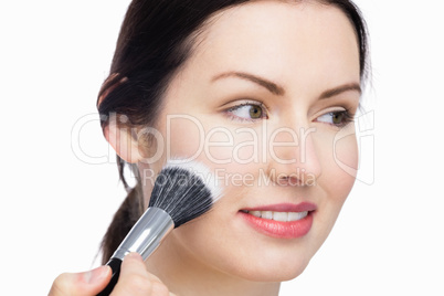 Gorgeous Woman applying makeup