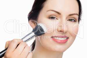 Gorgeous Woman applying makeup