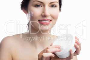 Woman applying a cream