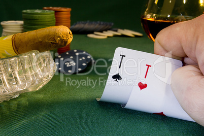 Poker concept with cards on green table