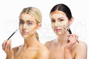 Women doing contouring on her face