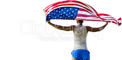 Rear view of sportsman holding american flag