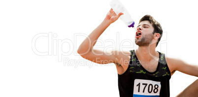 Portrait of sportsman drinking