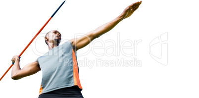 Low angle view of sportsman practising javelin throw
