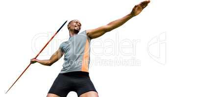 Low angle view of sportsman practising javelin throw