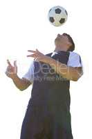Low angle view of man soccer player juggling with a ball