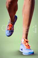 Composite image of close up of sportsman legs walking on a white