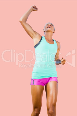 Composite image of sportswoman celebrating her victory