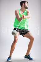 Composite image of sportsman throwing a hammer