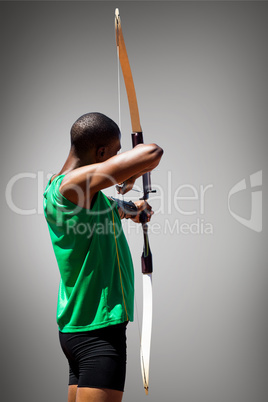 Composite image of rear view of sportsman doing archery on a whi