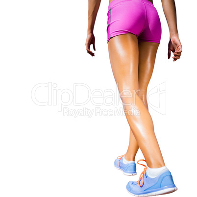 Rear view of sportswoman legs with sweat