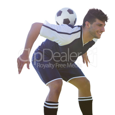 Man soccer player keeping the ball on his back