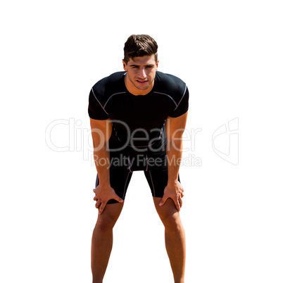 Sportsman posing his hands on knee