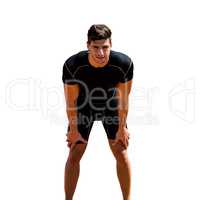 Sportsman posing his hands on knee