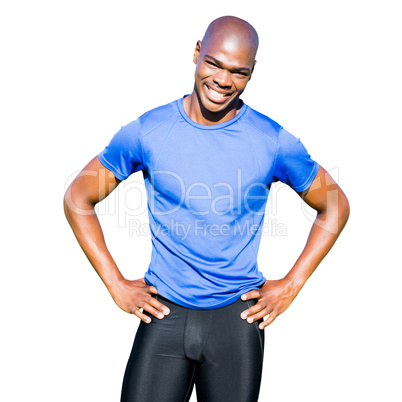 Sportsman smiling and posing on a white background