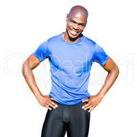 Sportsman smiling and posing on a white background