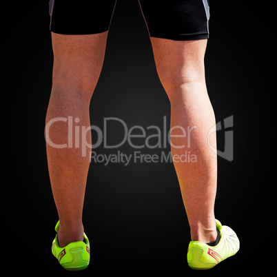 Close up of sportsman legs on a white background