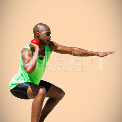 Composite image of sportsman practising the shot put
