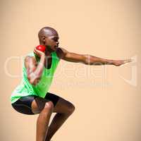 Composite image of sportsman practising the shot put