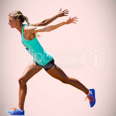 Composite image of sportswoman finishing her run