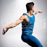Composite image of side view of man throwing discus