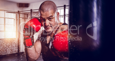 Composite image of boxer performing upright stance