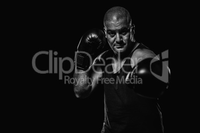 Composite image of boxer performing upright stance