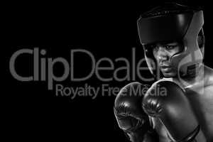 Composite image of boxer performing boxing stance