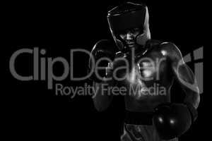 Composite image of boxer performing boxing stance