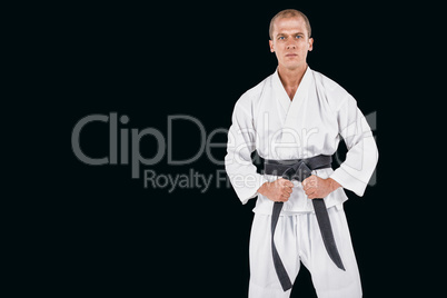 Composite image of fighter performing karate stance