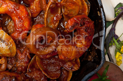 fresh seafoos stew on an iron skillet