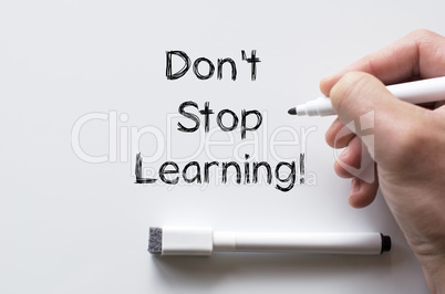 Don't stop learning written on whiteboard