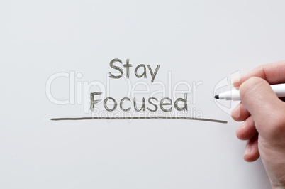 Stay focused written on whiteboard