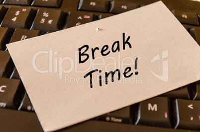 Break time concept on keyboard background