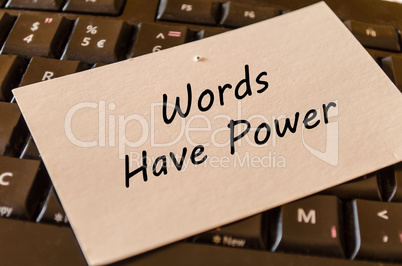 Words have power concept on keyboard background