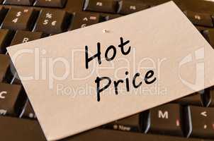 Hot price concept on keyboard background