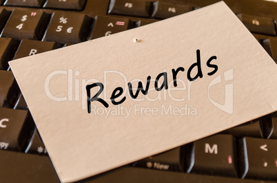 Rewards concept on keyboard background