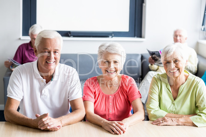 Seniors sitting at a table