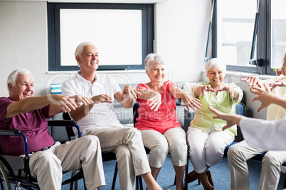 Seniors doing exercises