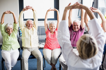 Seniors doing exercises